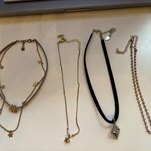 four neck chokers and bracelets
